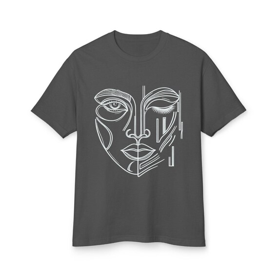 Charcoal t-shirt with a white hand-drawn One-Eyed Muse face from a small-batch boutique collection