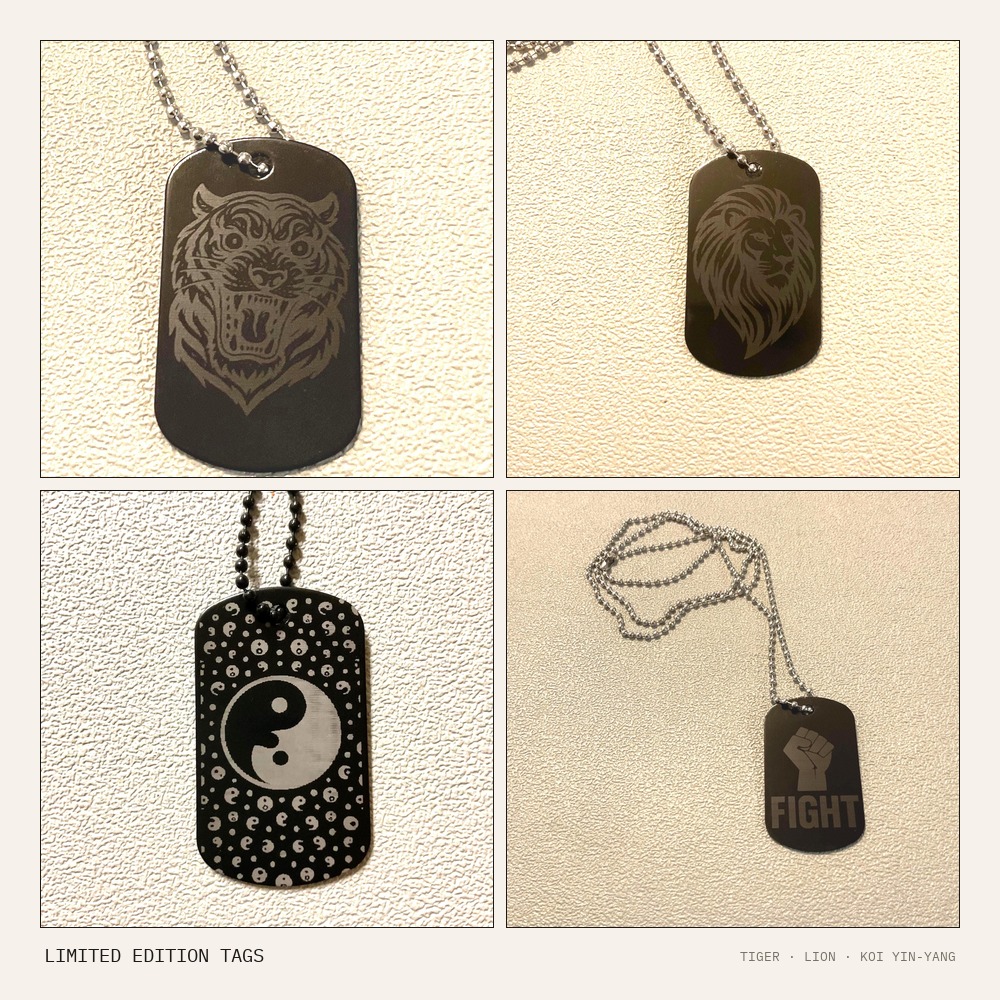 Collage of limited edition laser engraved dog tags including fierce tiger, regal lion, and FIGHT fist designs