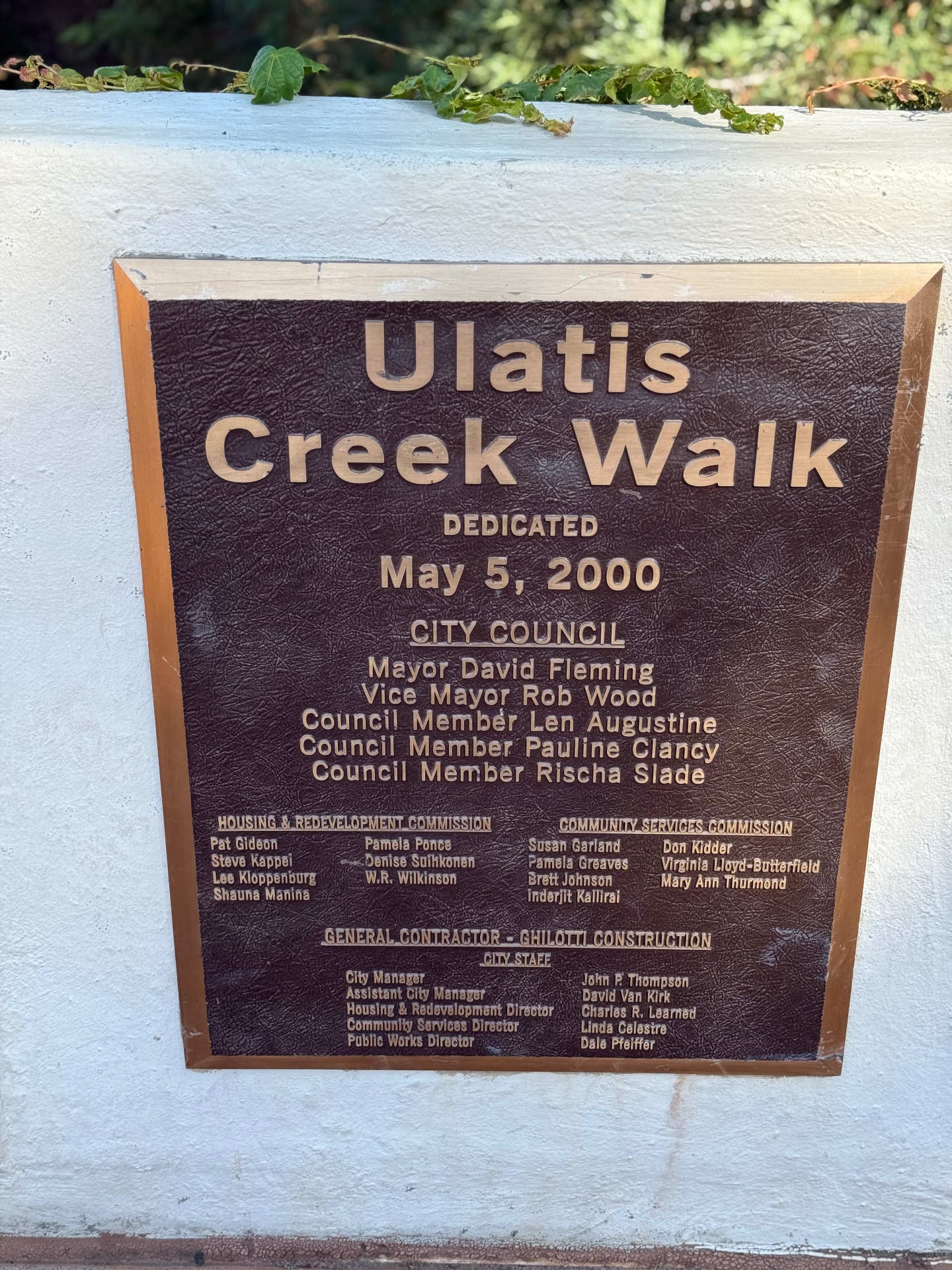 Bronze dedication plaque for the Ulatis Creek Walk dated May 5, 2000, mounted along the creek path in Vacaville, California — photographed by Robert and Angela of Robert Anthony Art